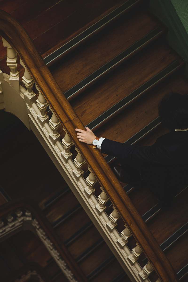 leisure activities man climbing up the wooden stairs music